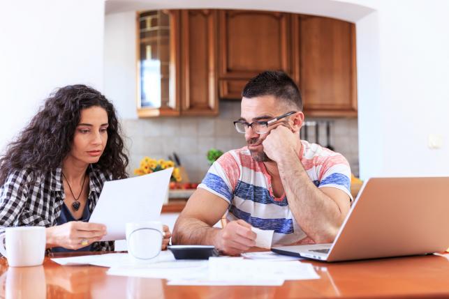 Couple goes over finances involving the premium tax credits